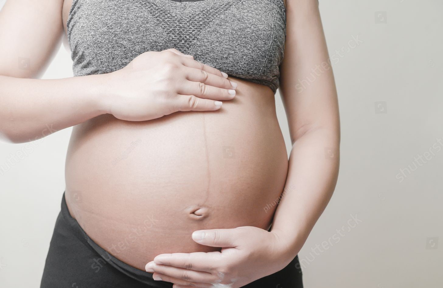 allforone - stock-photo-weeks-pregnant-women-on-white-use-your-belly-grip-with-love-797558644
